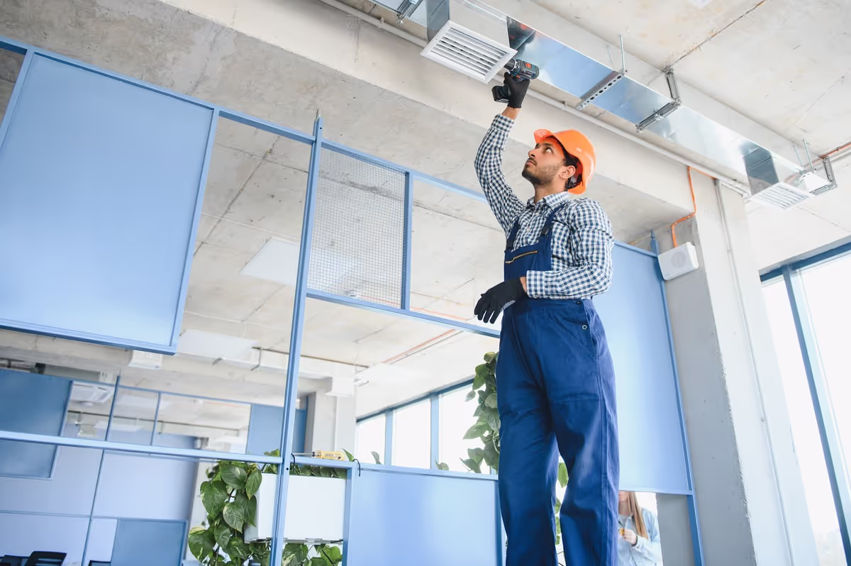 NICEIC-certified engineer commissioning an MVHR unit in a London property