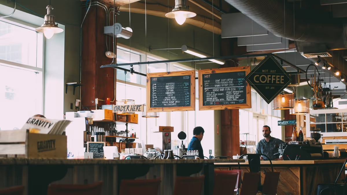 Café and hospitality environment where commercial ventilation manages air quality