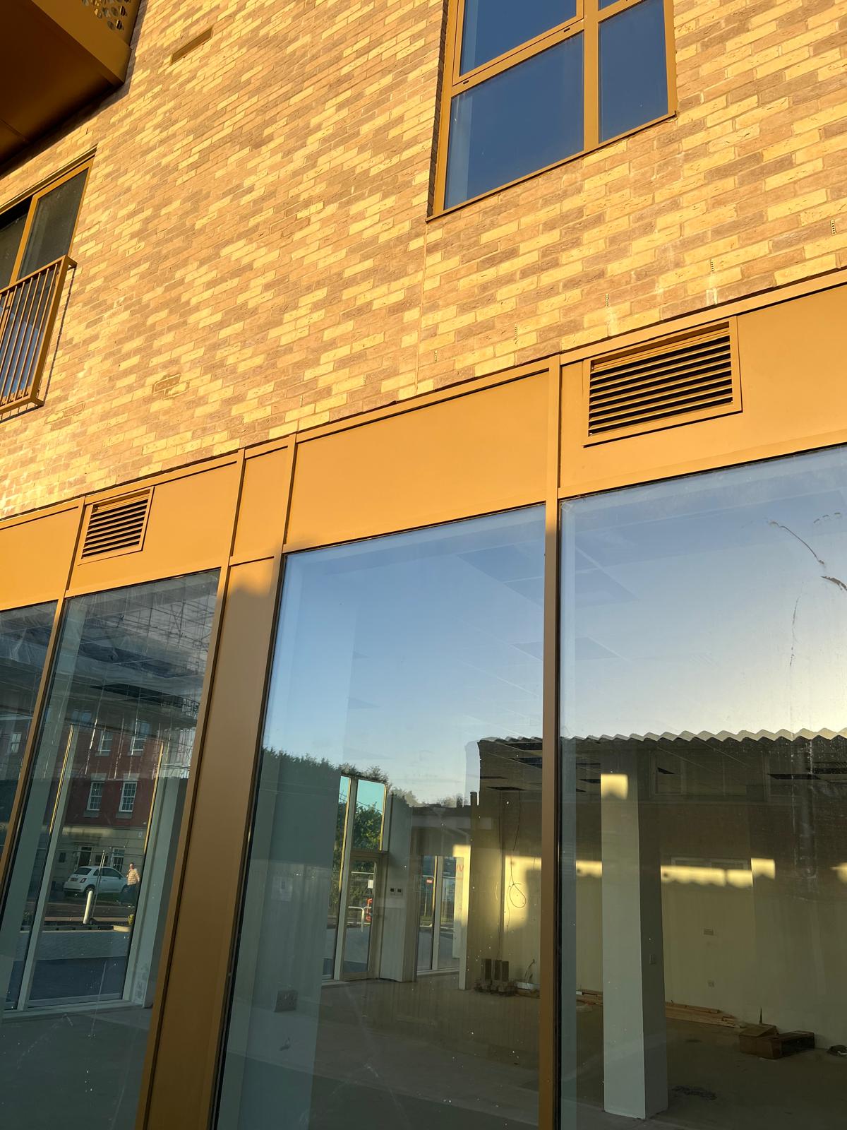 Mixed-use residential and commercial MVHR system installation at 30 Radford Way